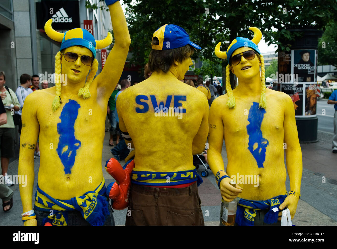 Swedish football fans painted in national colours in Berlin during World Cup 2006 in Germany Stock Photo