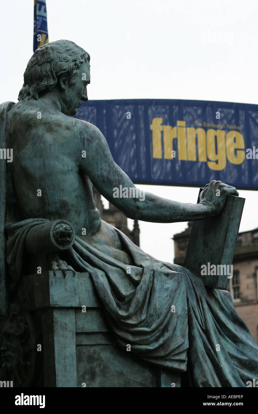 Statue of philospher David Hume on Royal mile with Edinburgh Fringe sign   Scotland August 2007 Stock Photo