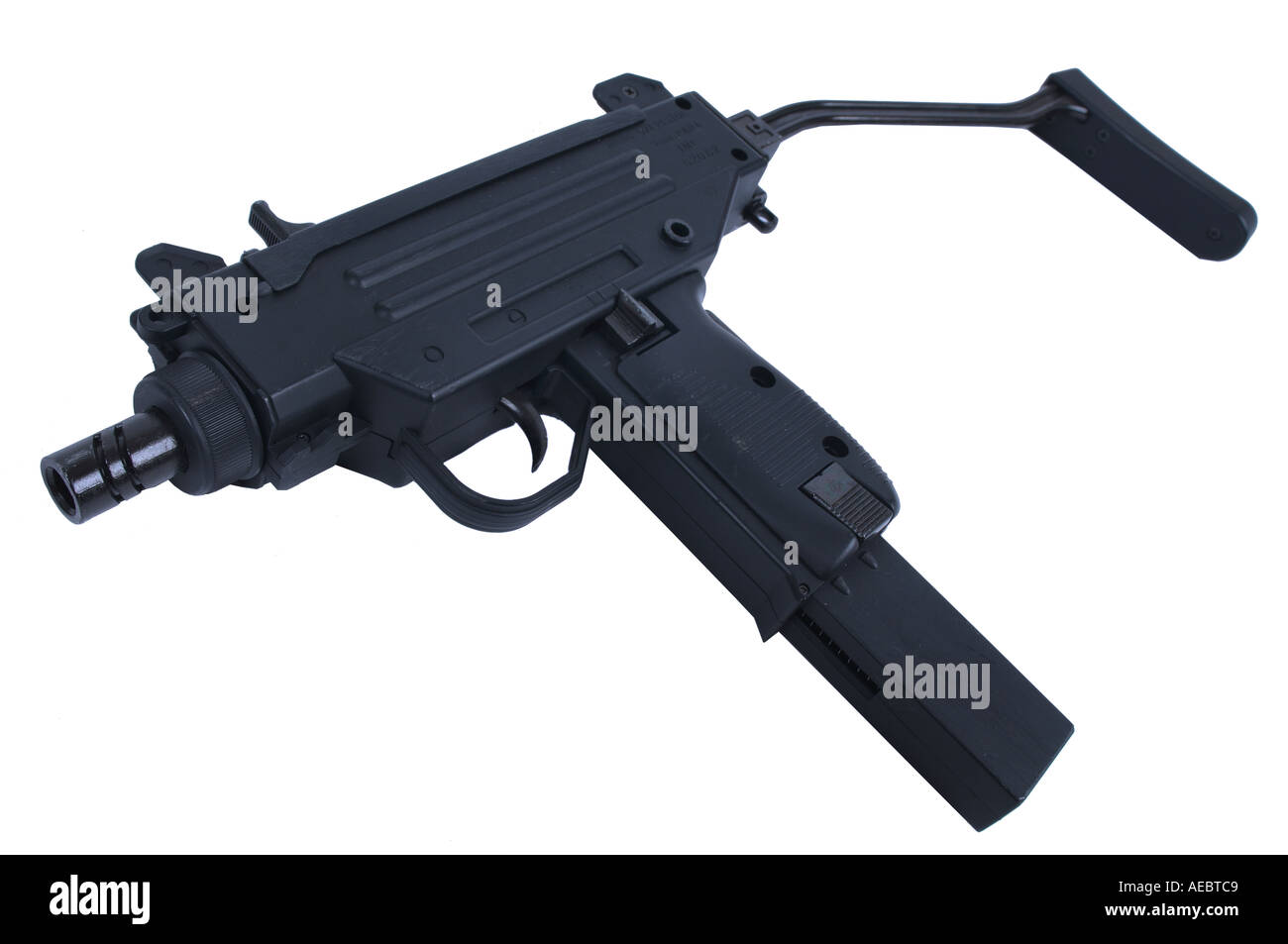 cut out of an uzi machinegun pistol Stock Photo