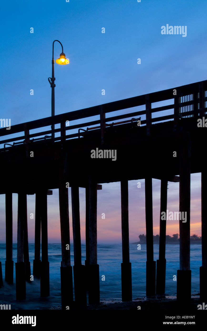 Ventura Pier With Lone Light Post Lamp At Sunset, Ventura California USA Stock Photo
