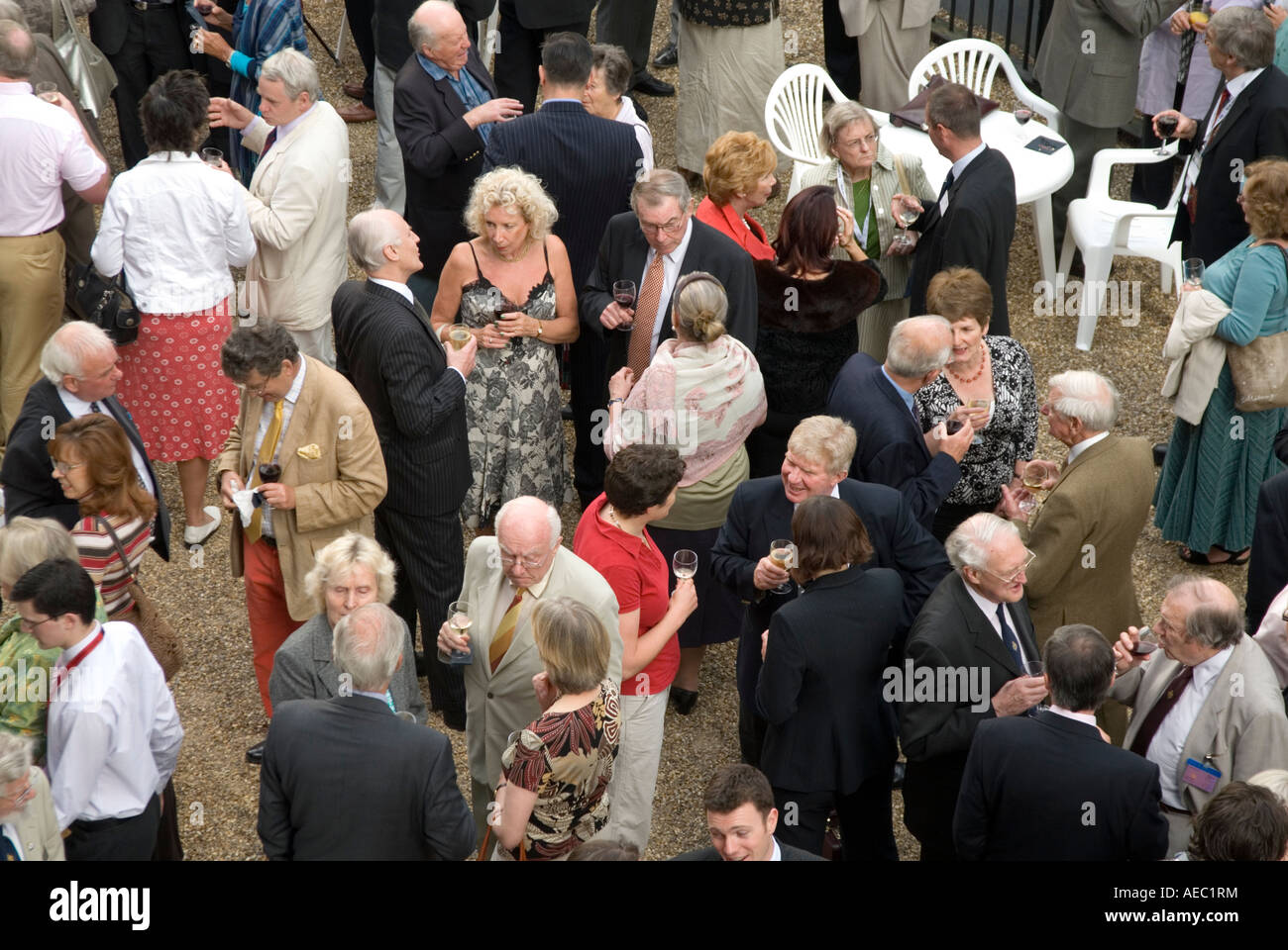 English people drinking and socialising at society event London England UK Stock Photo