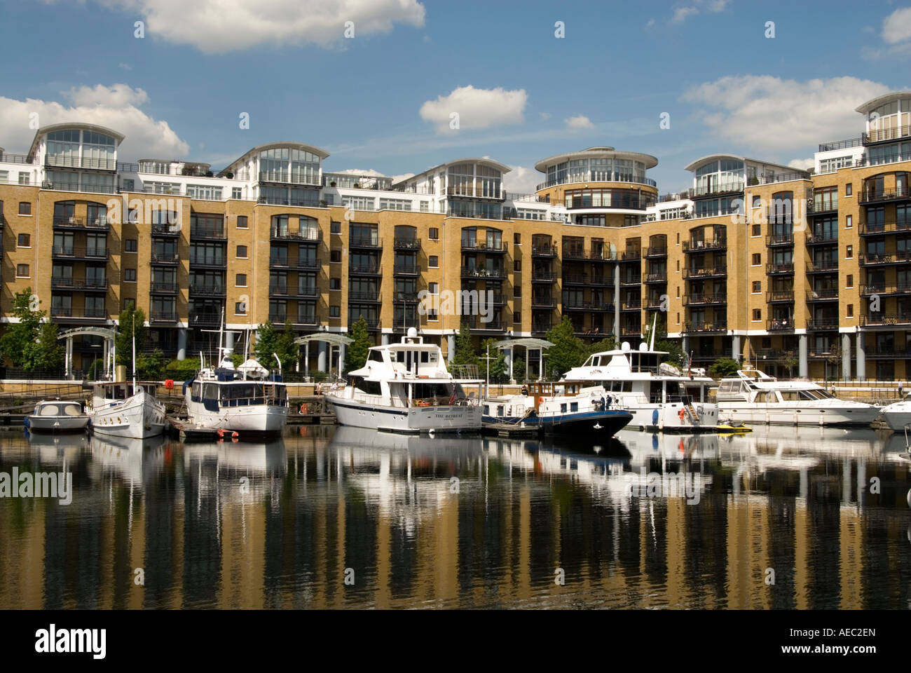 Yachts and apartments at St Katherine's Dock London England UK Stock Photo