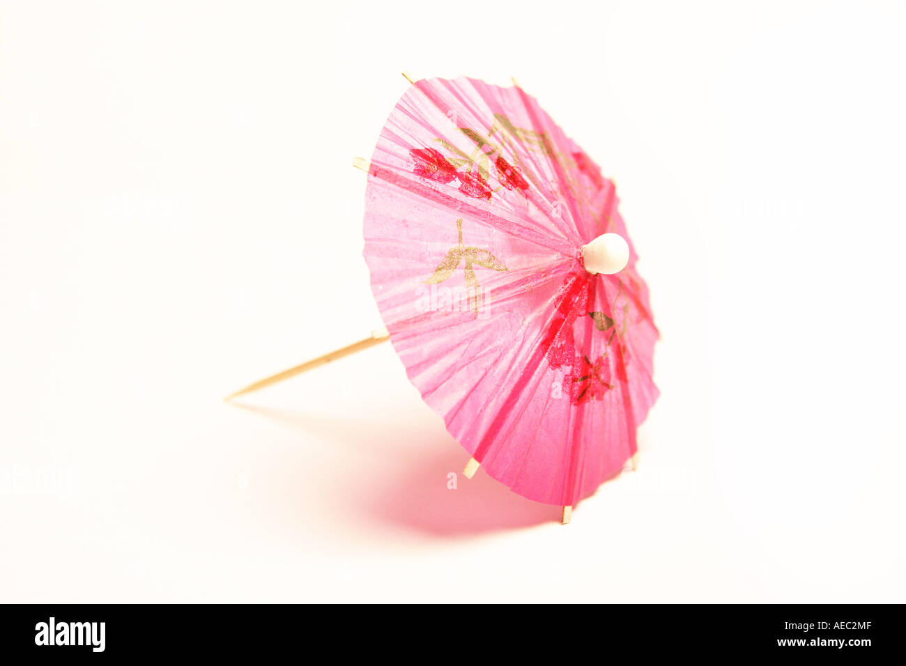 Pink cocktail umbrella Stock Photo