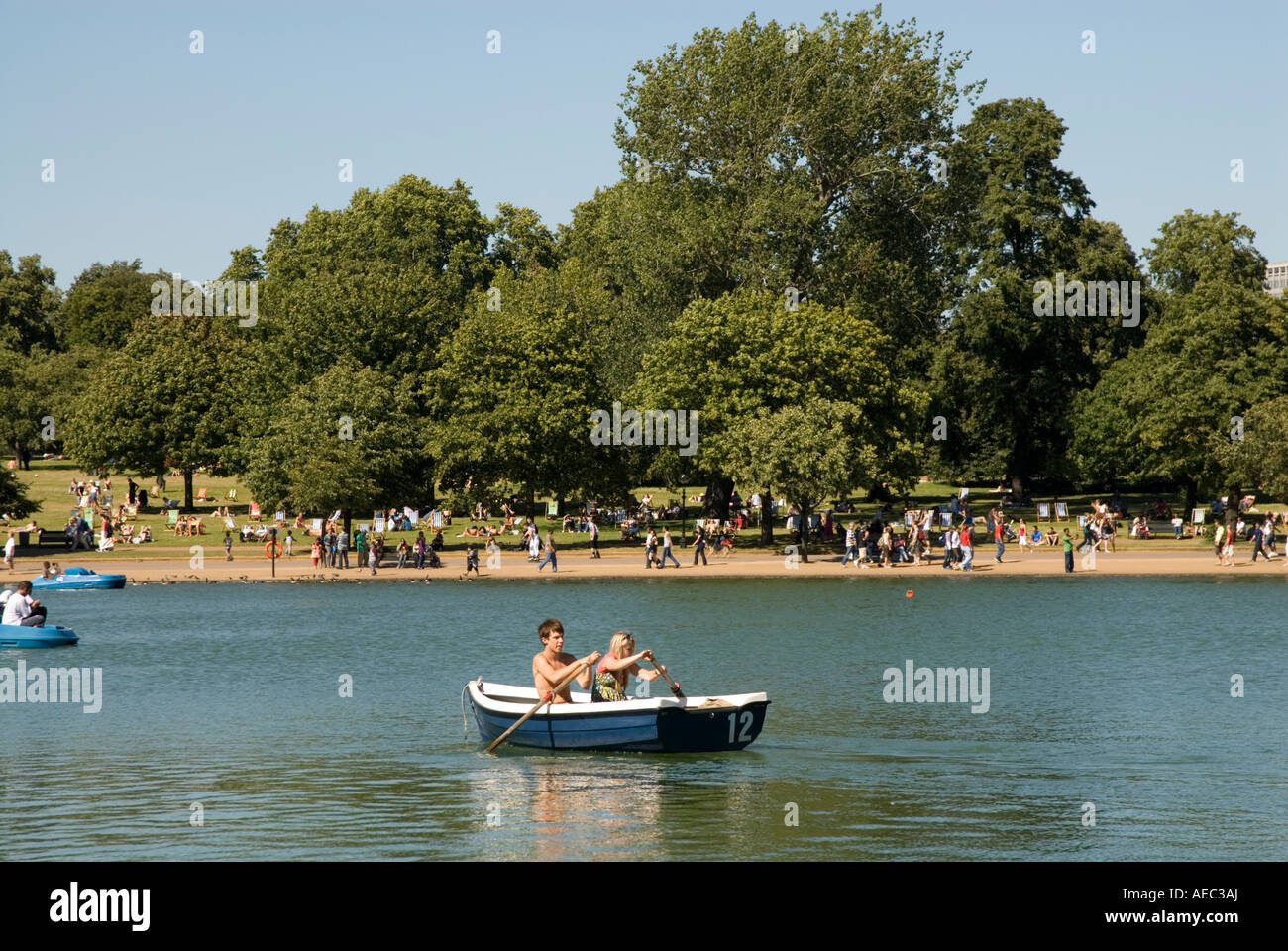 Boats on the Serpentine in Hyde Park, London, England, UK Stock Photo
