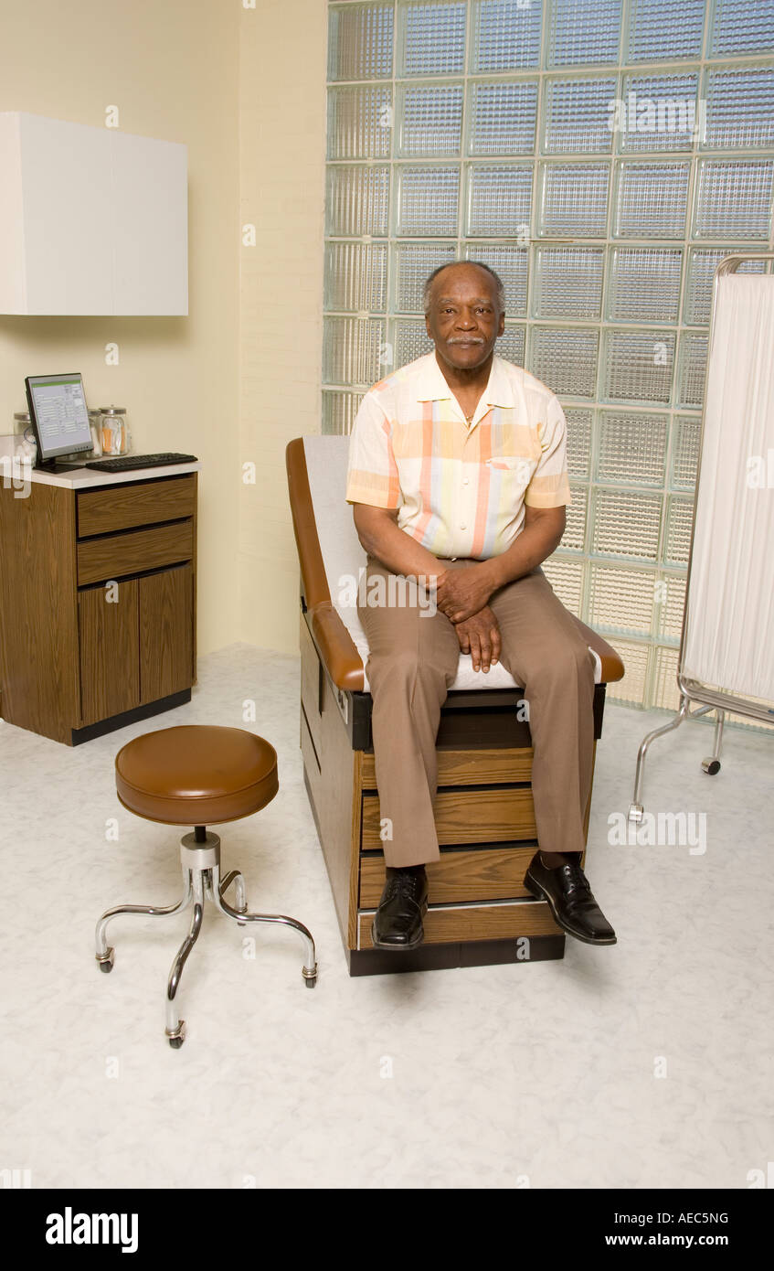 Mature Adult Waits In The Exam Room To See The Doctor Stock Photo Alamy