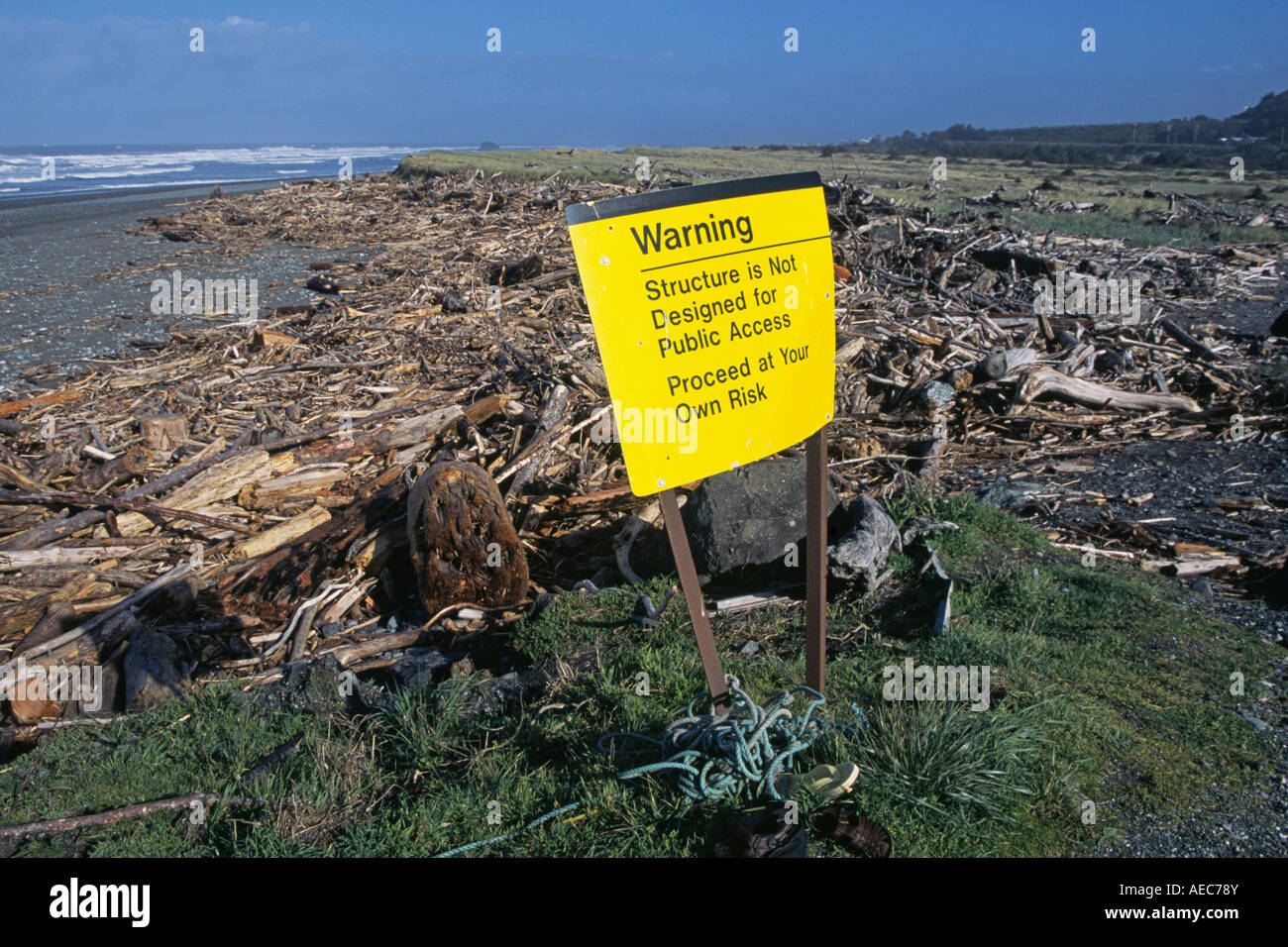 A sign on the beach near the town of Gold Beach Oregon warns visitors