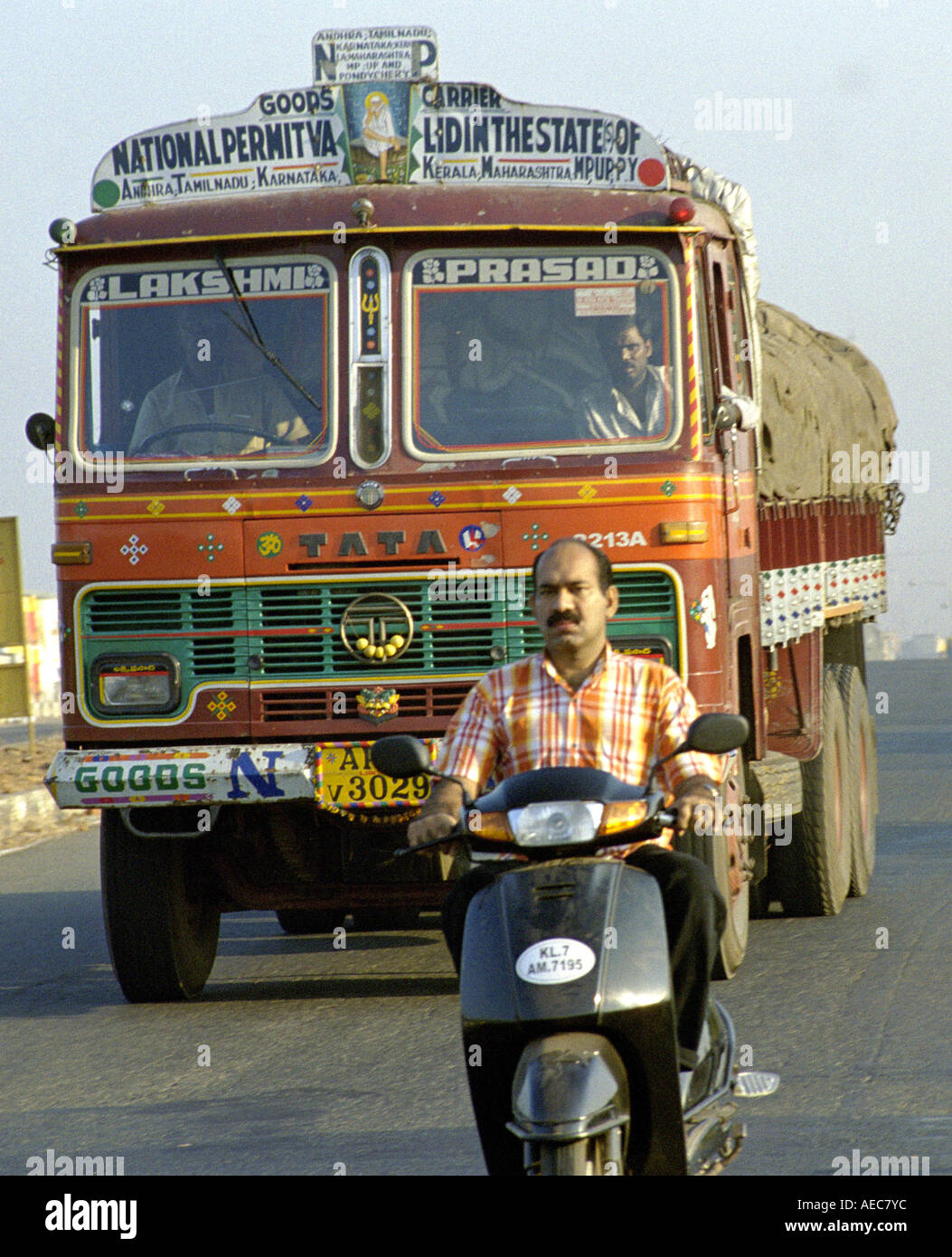 A view of Cochin city and highway, Kerala, India, with a truck and motorist. Stock Photo