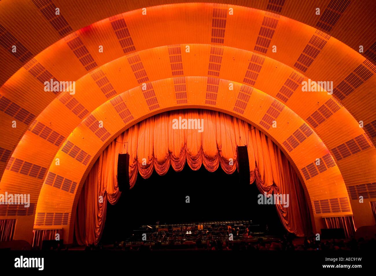 Orange curtains above stage inside the Radio City Music Hall New York USA 3 February 2007 Stock Photo