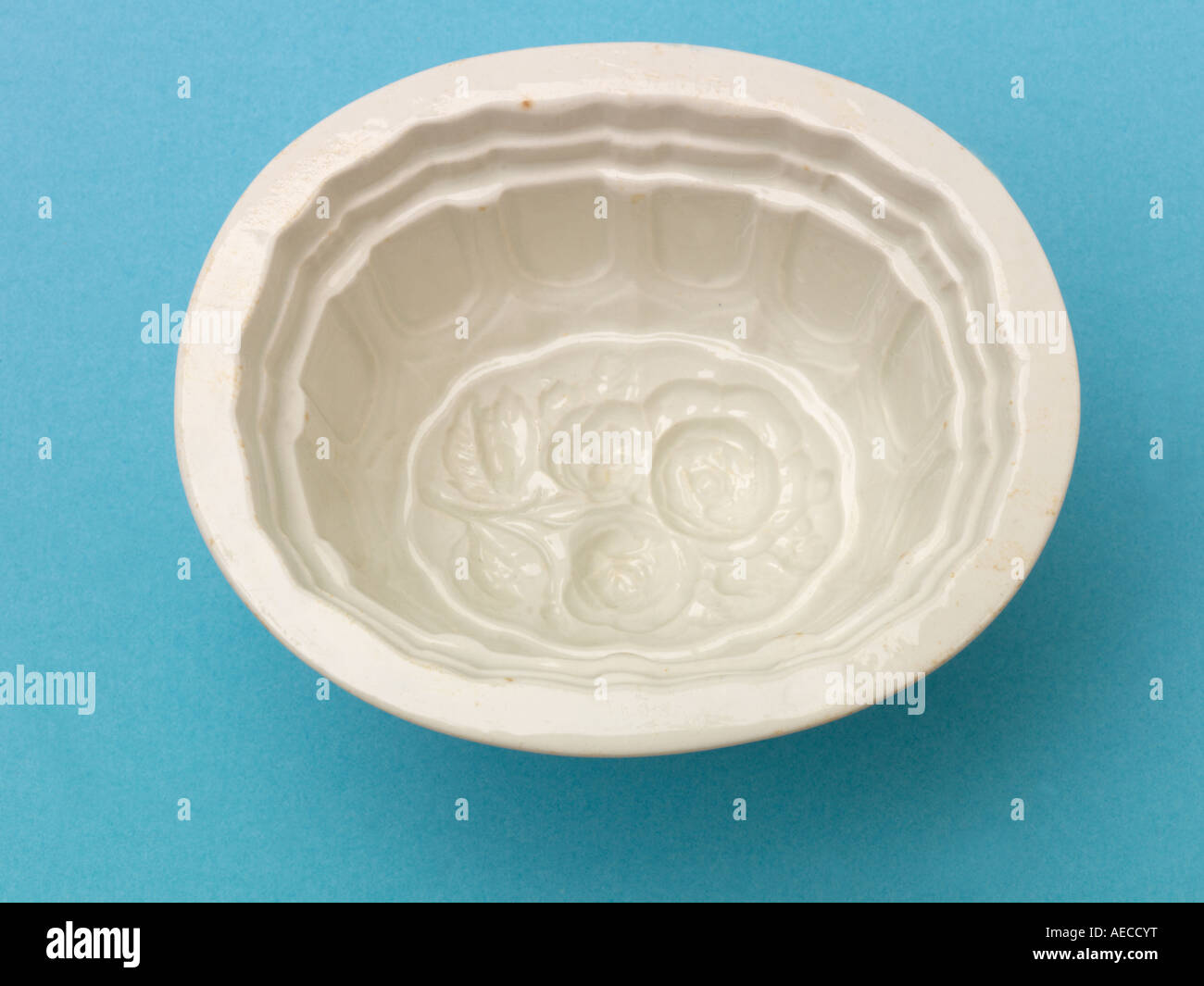 Antique White Ceramic Victorian Jelly Mould with Imprinted Roses Stock