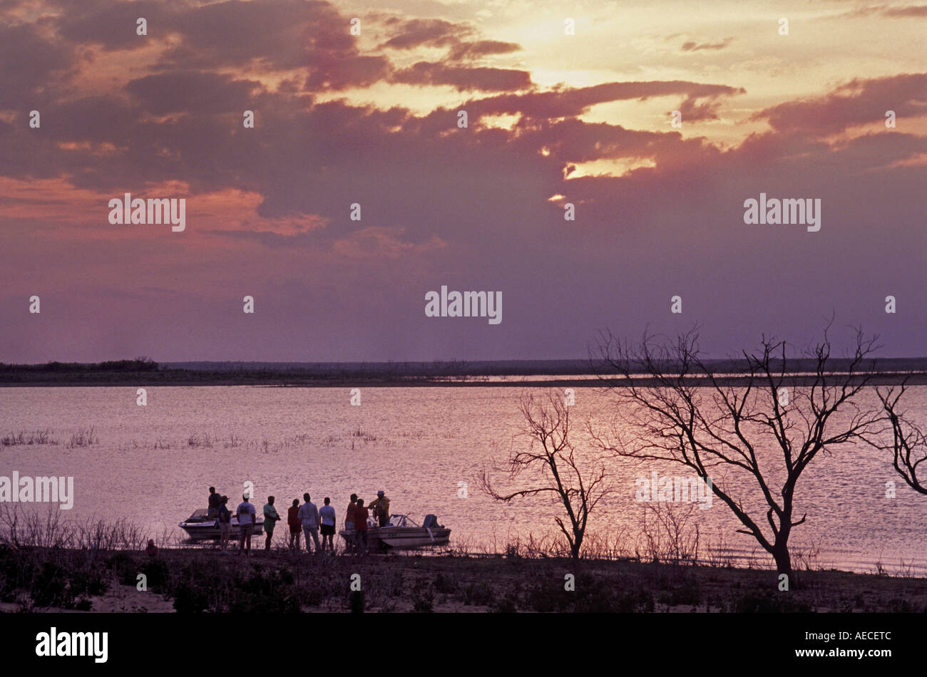 Boats, people at sunset at Calliham Unit of Choke Canyon Reservoir