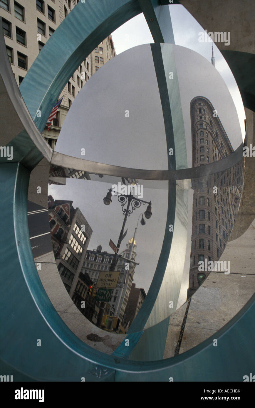 flatiron reflected in mirrored sculpture NYC Stock Photo