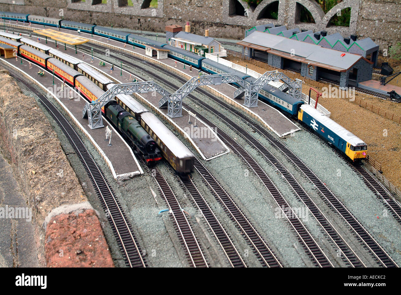 A model train setup including platform and passengers Stock Photo Alamy