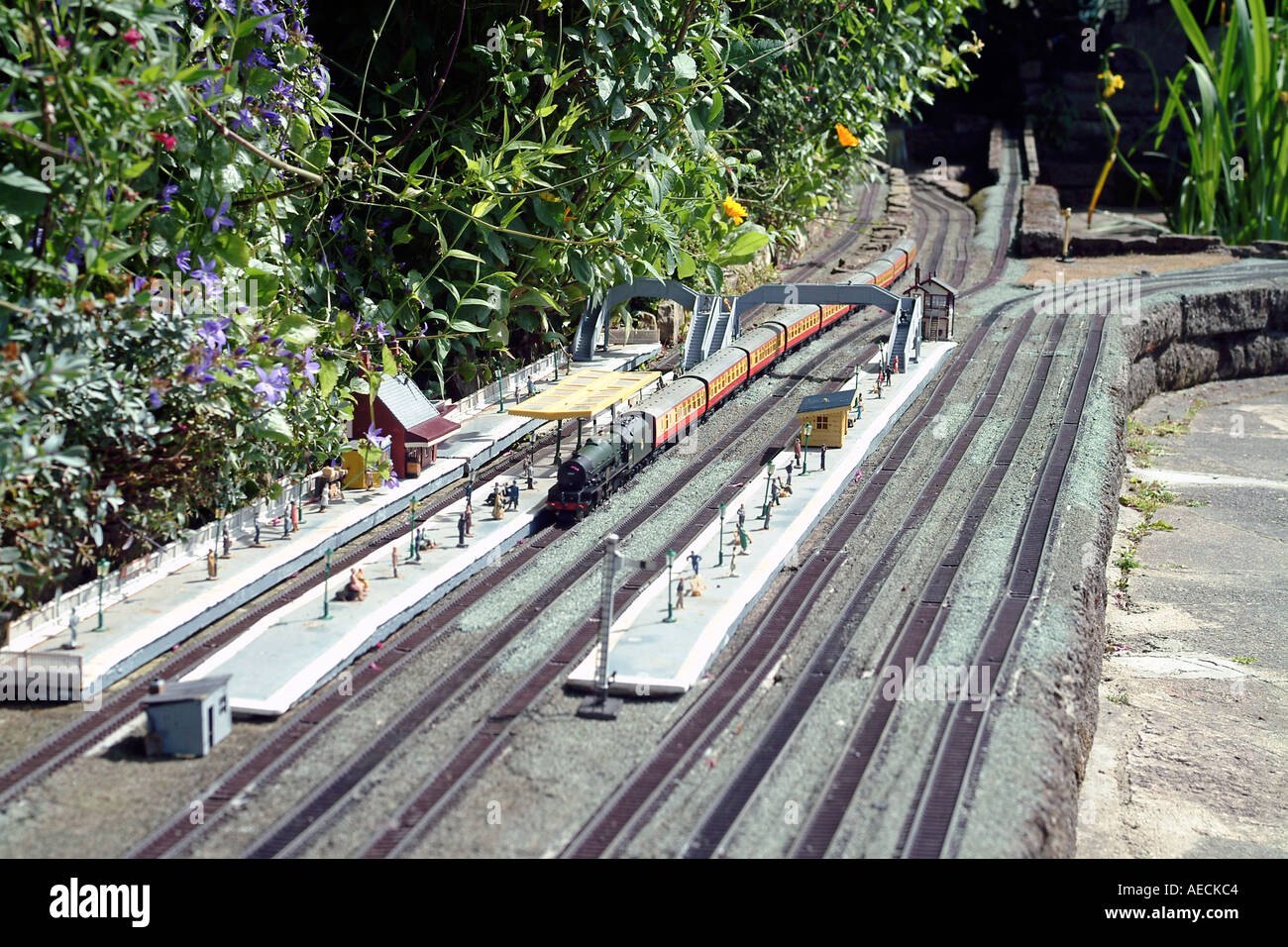 A model train setup including platform and passengers Stock Photo Alamy
