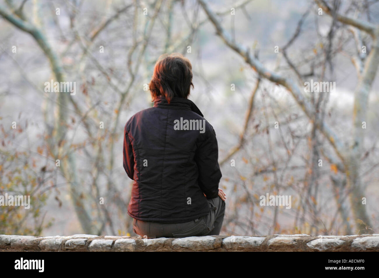 African woman sitting hi-res stock photography and images - Alamy