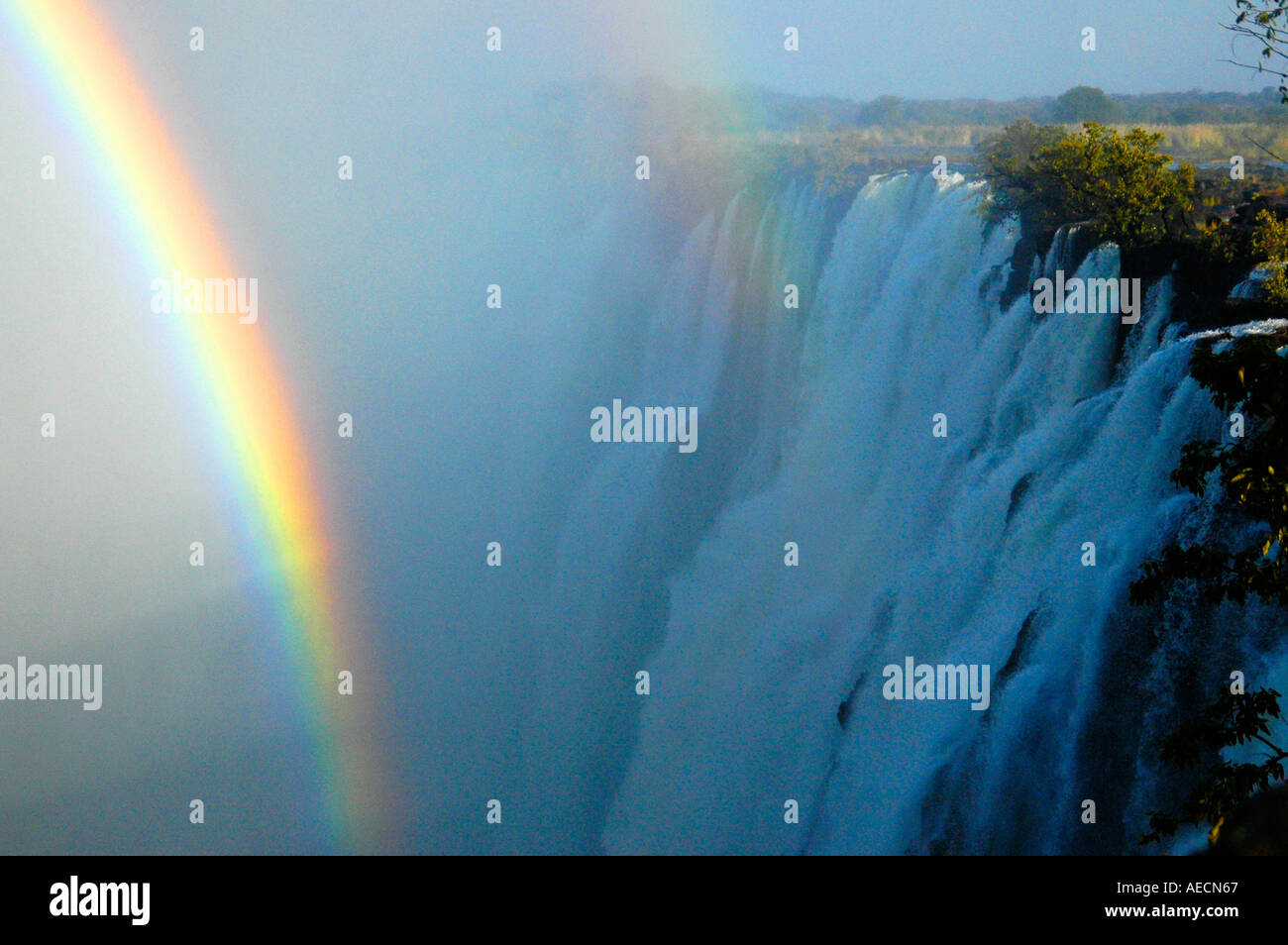 Rainbows over the eastern cataracts of Victoria Falls on the Zambian side Stock Photo