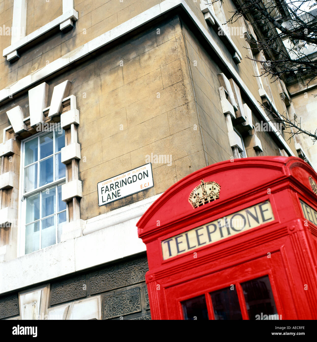 Red London phone box and Farringdon Lane street sign in London England UK KATHY DEWITT Stock
