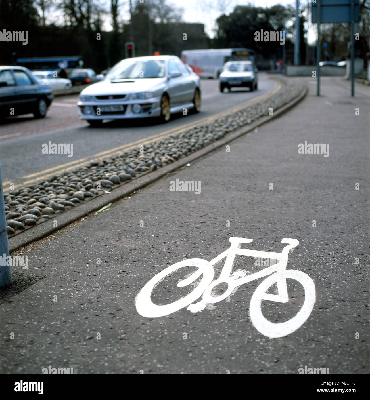 Bicycle lane and traffic Cardiff Wales UK Stock Photo