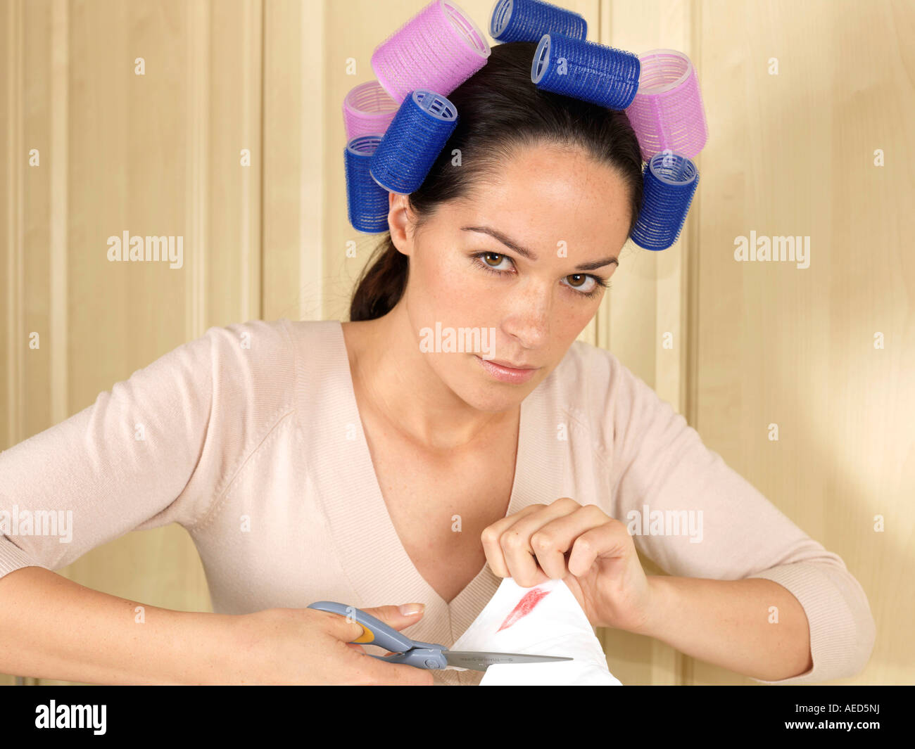 Angry Woman Cutting Shirt Model Released Stock Photo - Alamy