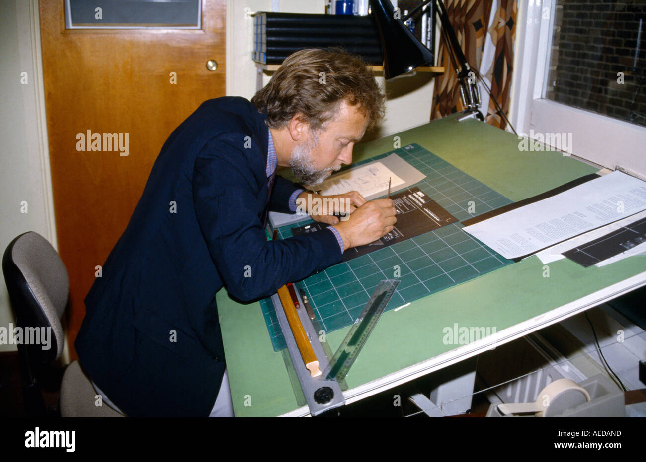 Designer Drawing in Design Room Stock Photo