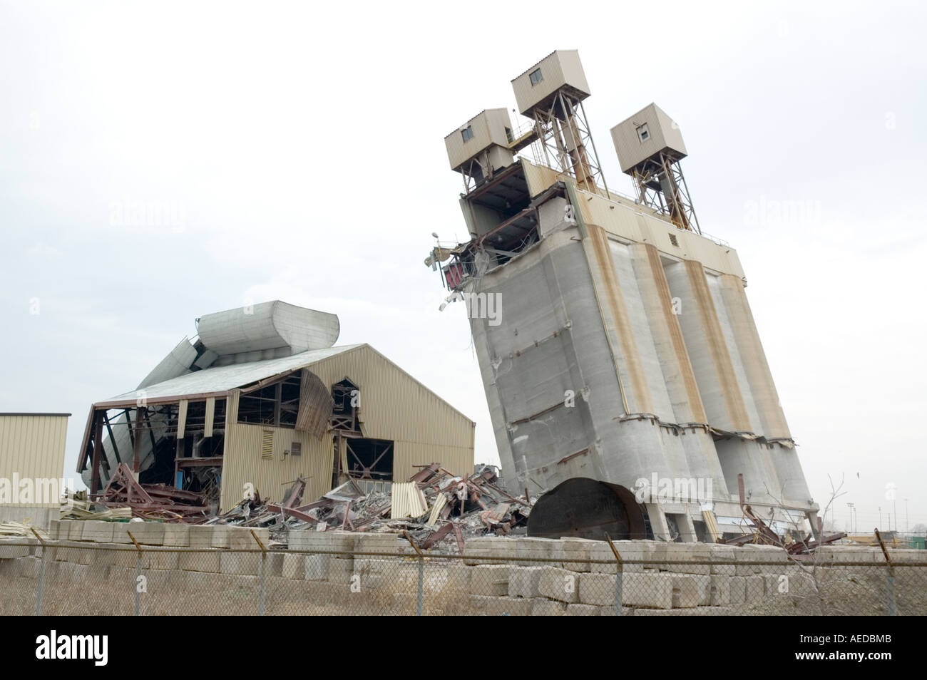 Leaning concrete tower during explosive demolition Stock Photo Alamy