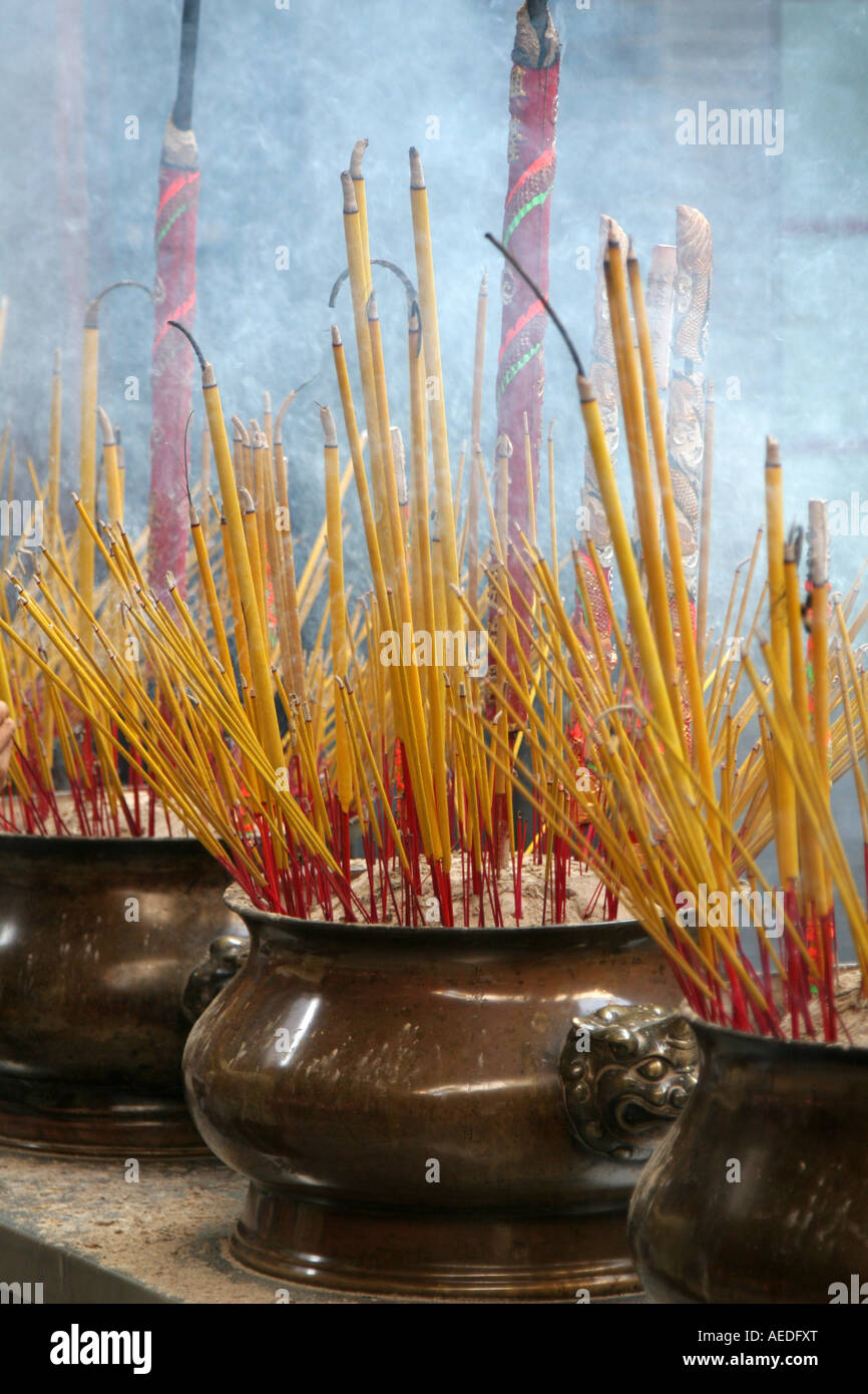 Burning incense at a temple in chinatown, saigon, vietnam Stock Photo