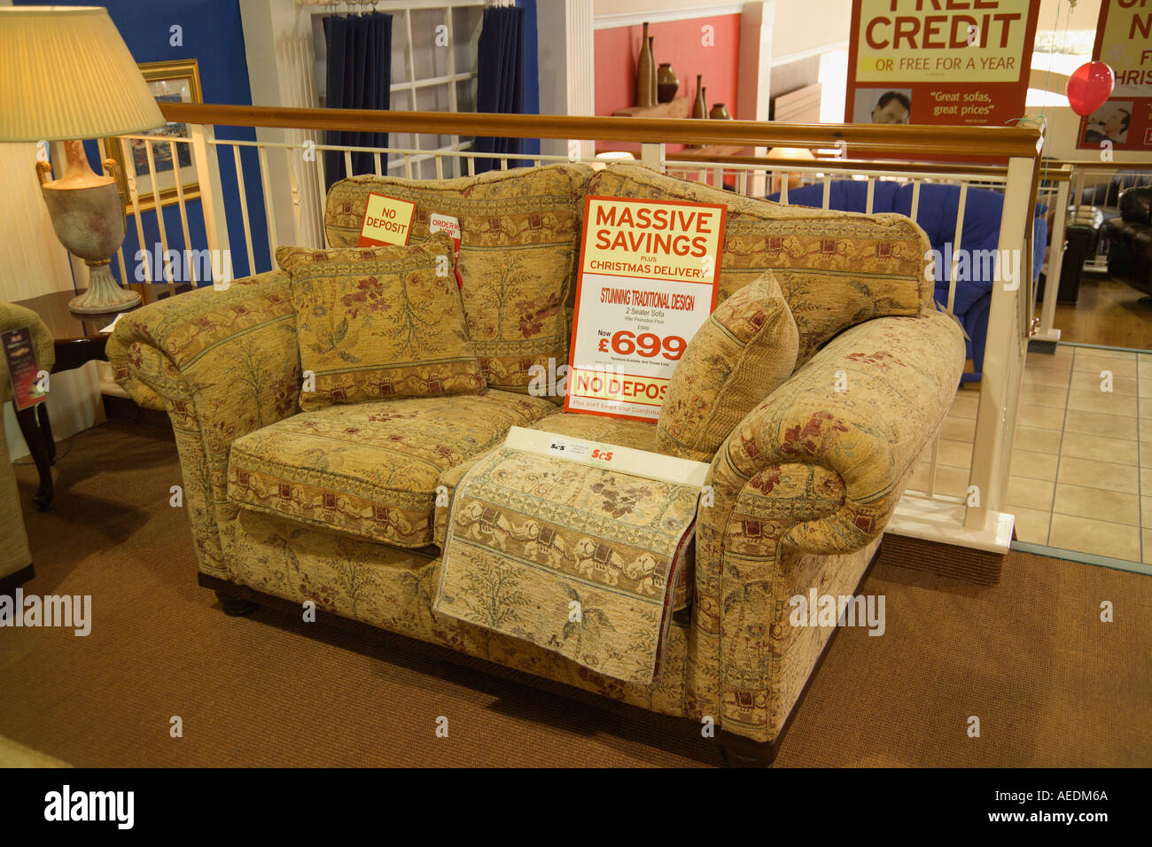 sofa on sale in furniture [massive savings] shop Stock Photo - Alamy