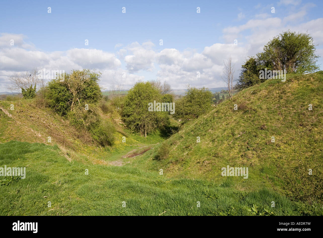 UK Wales Powys Builth Wells castle mound motte and bailey ditch Stock Photo