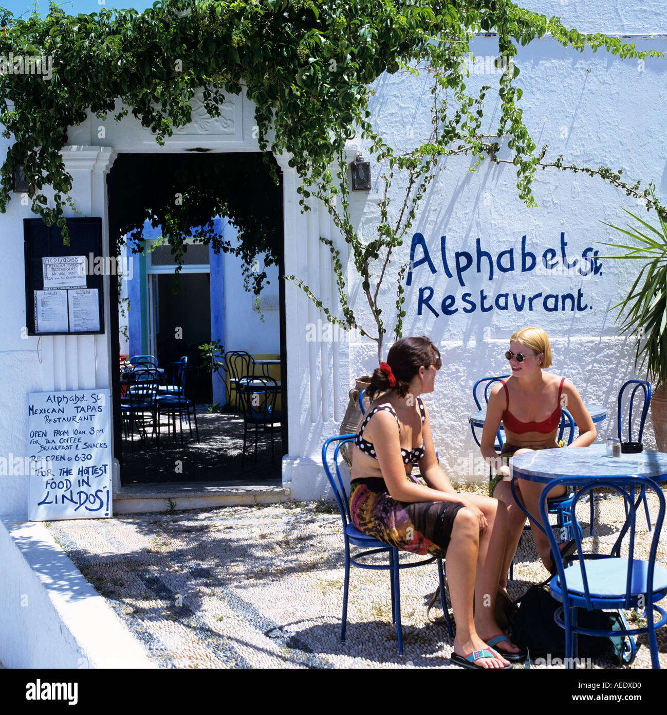 Teenage Girls Drinking Coffee Taverna Lindos Rhodes Greek Islands