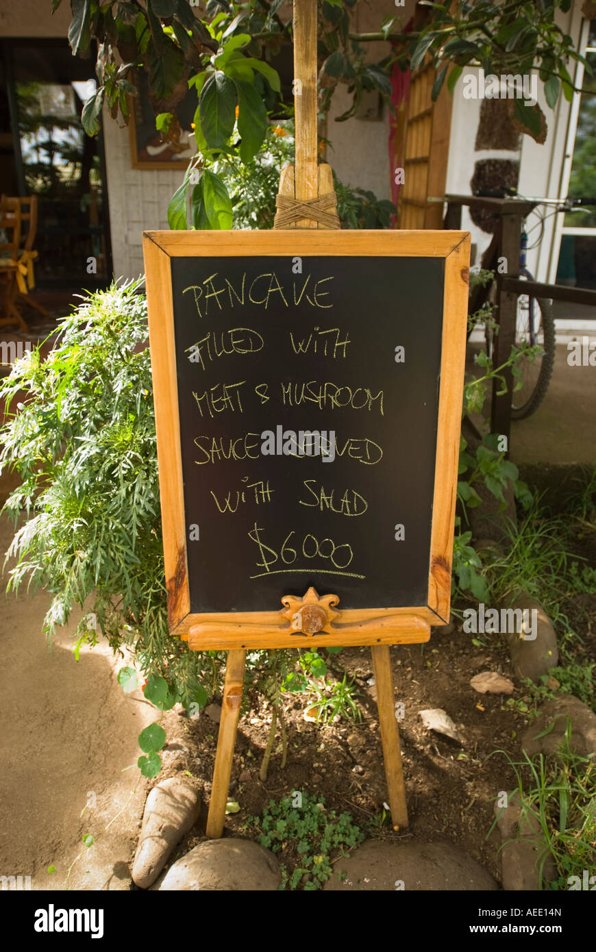 Meat and mushroom pancakes on the menu board at a restaurant in Hanga Roa on Easter Island. Stock Photo