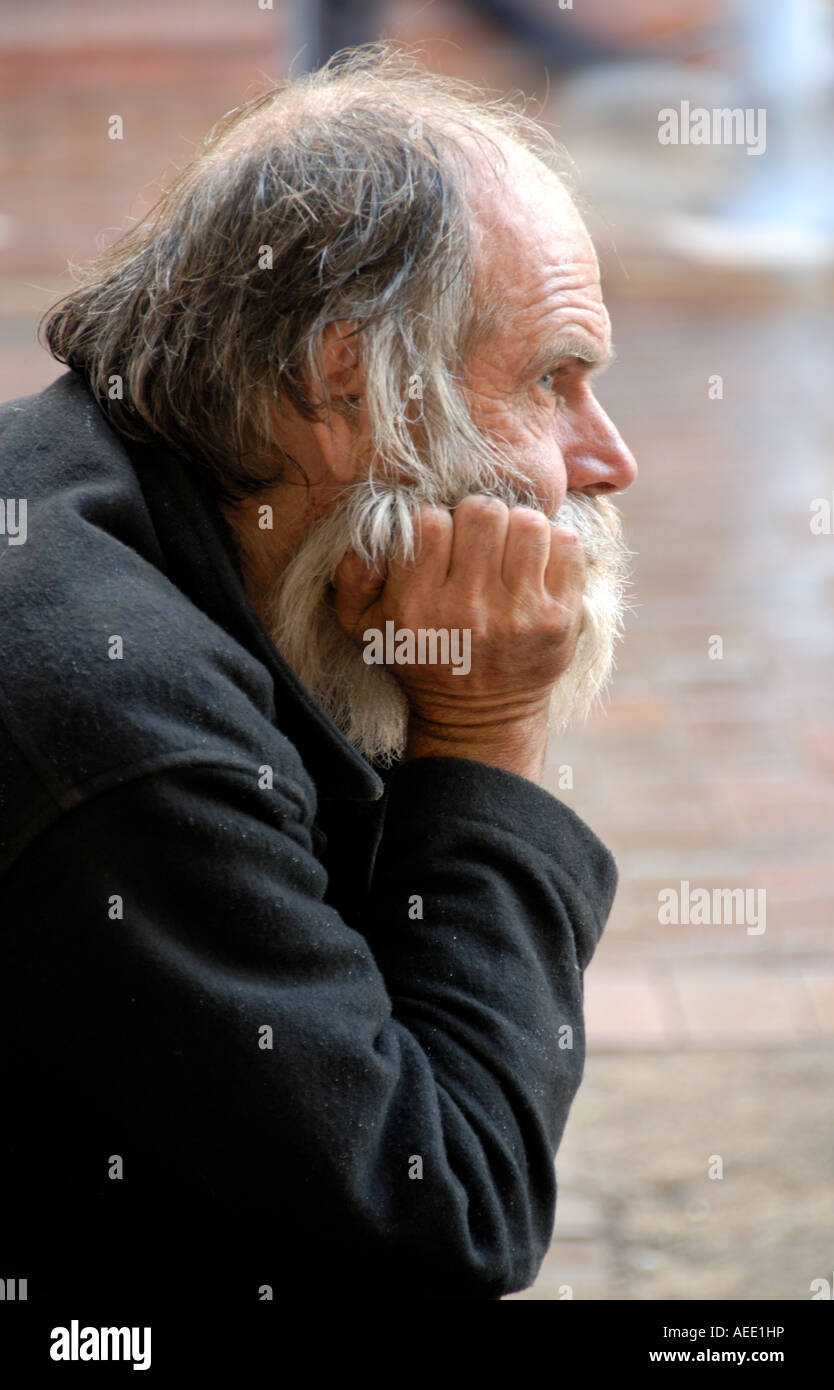 Elderly bearded man staring into the distance Stock Photo