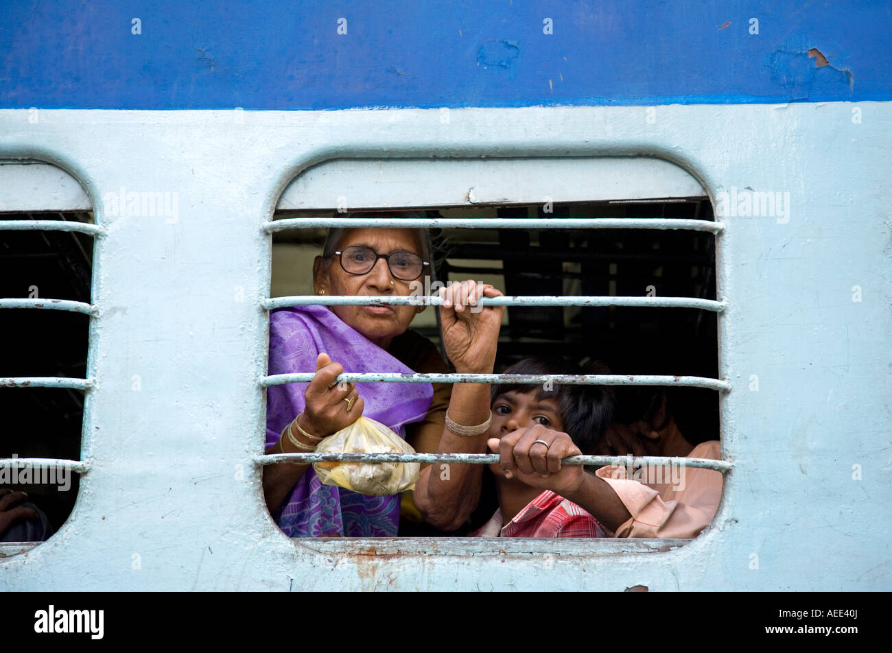Passengers looking through the window. Train Gorakhpur to Varanasi