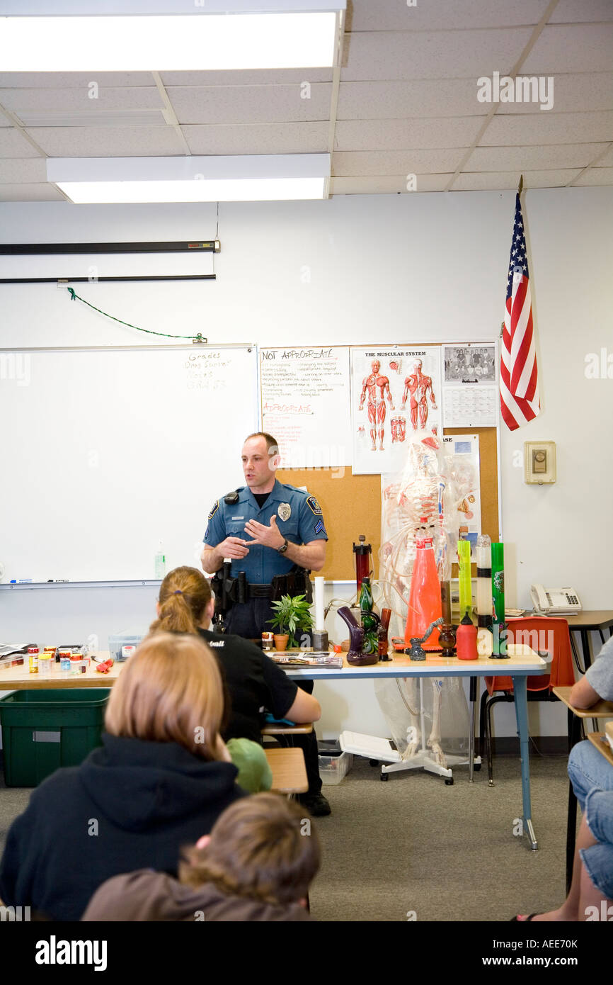 Police officer giving presentation about illegal drugs to a high school class. Crete, Nebraska, USA. Stock Photo