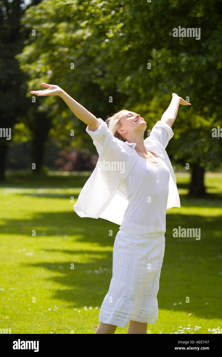 Portrait excited woman dancing park hi-res stock photography and images ...