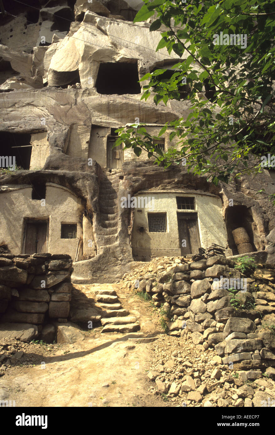 In remote parts of western China Troglodyte dwellings were being lived  in during the  1990s Stock Photo