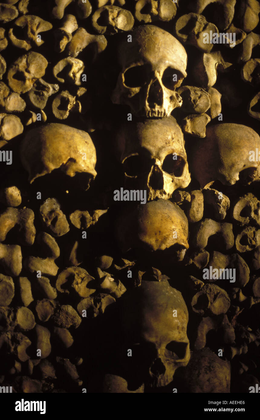 Skulls decorate the underground tunnels of the Paris Catacombs Stock Photo