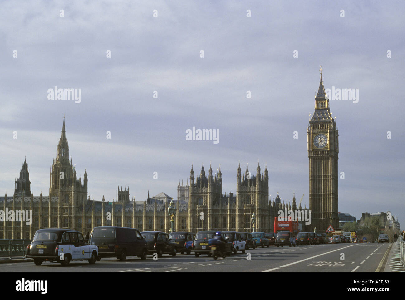The Houses of Parliament in Westminster on the banks of the Thames River in London Stock Photo