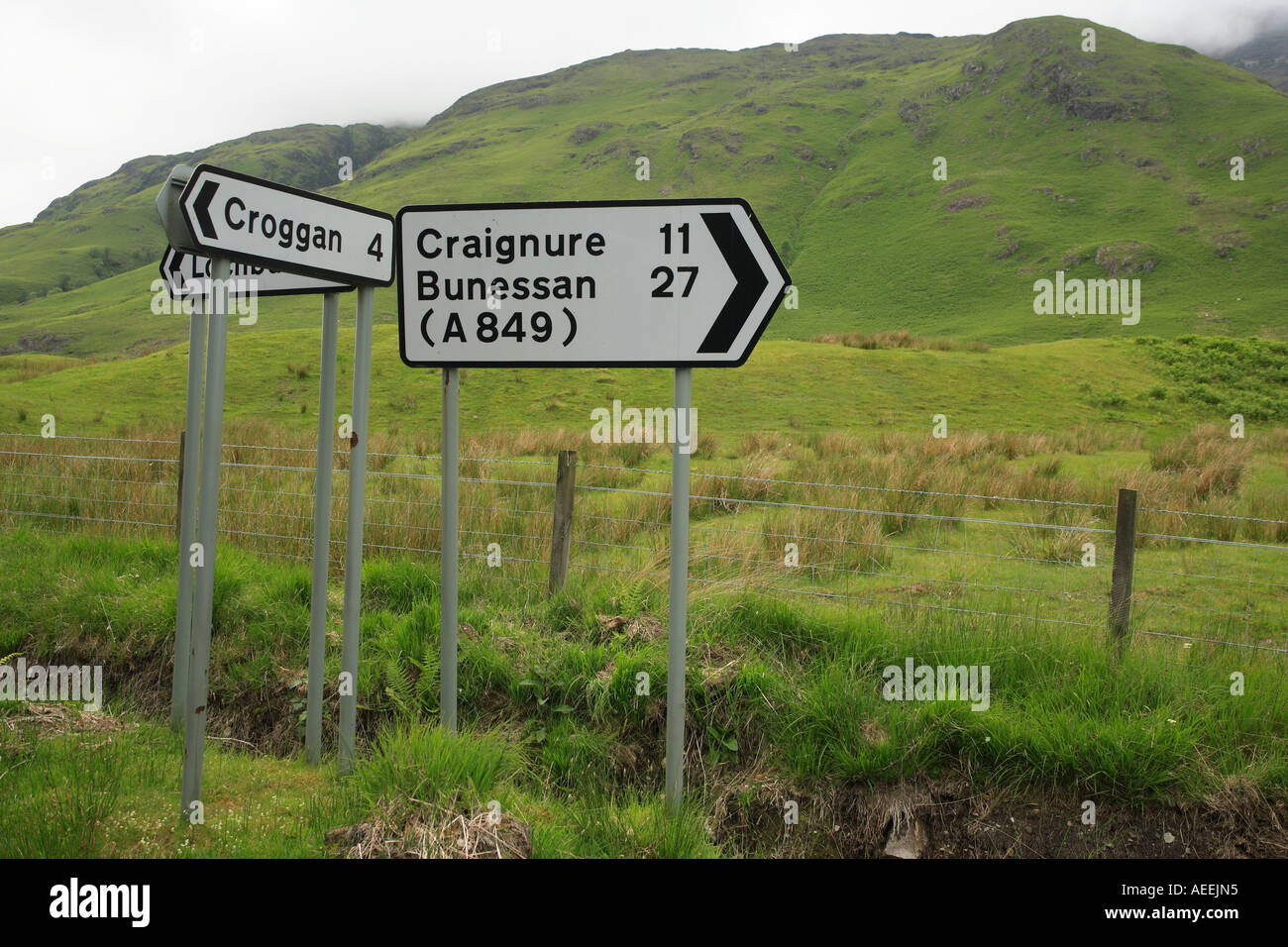 Modern signpost on Mull Scotland Craigure 11 Bunessan 27 Croggan 4 Lochbuie 3 miles Stock Photo