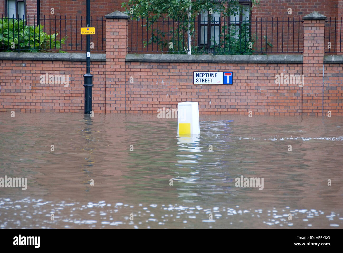 A flooded street in Leeds uk Stock Photo - Alamy