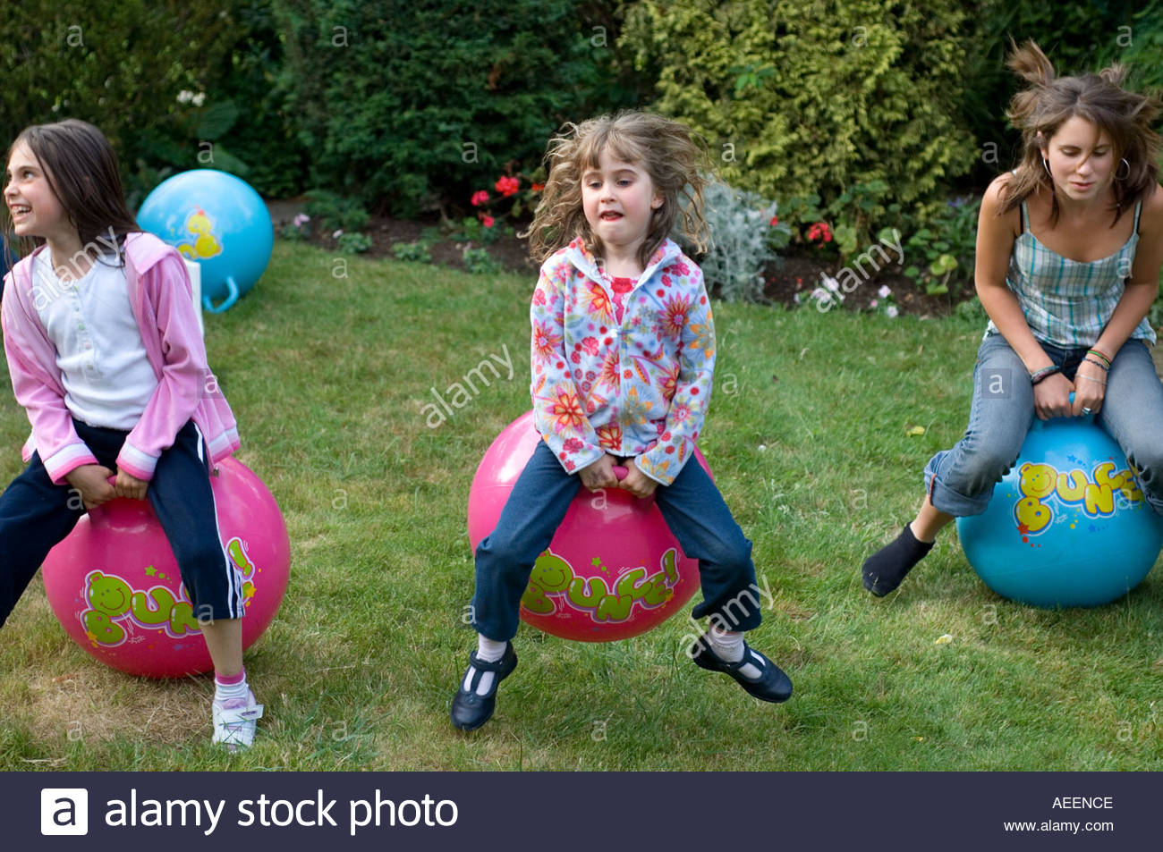 girls on space hoppers