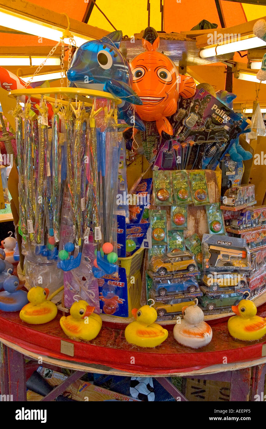 Hook a duck fairground stall with toy prizes Stock Photo Alamy
