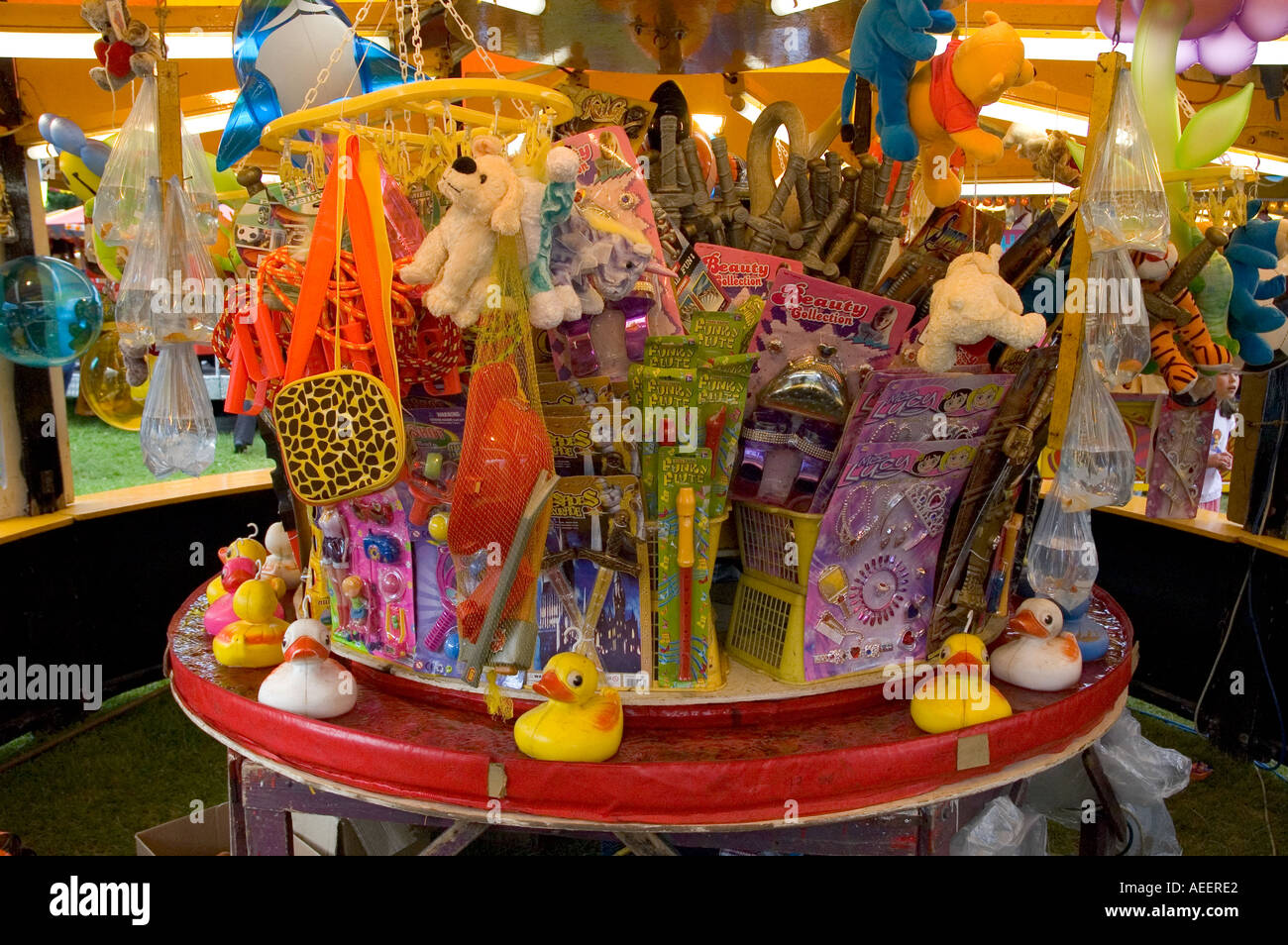 Hook a duck fairground stall with prizes including toys and goldfish