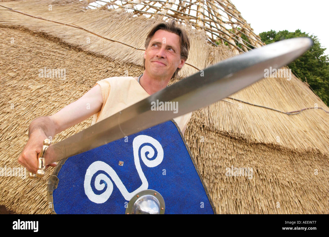 Iron Age roundhouse built using traditional techniques at Cinderbury Iron Age Farm near Coleford Gloucestershire England UK Stock Photo