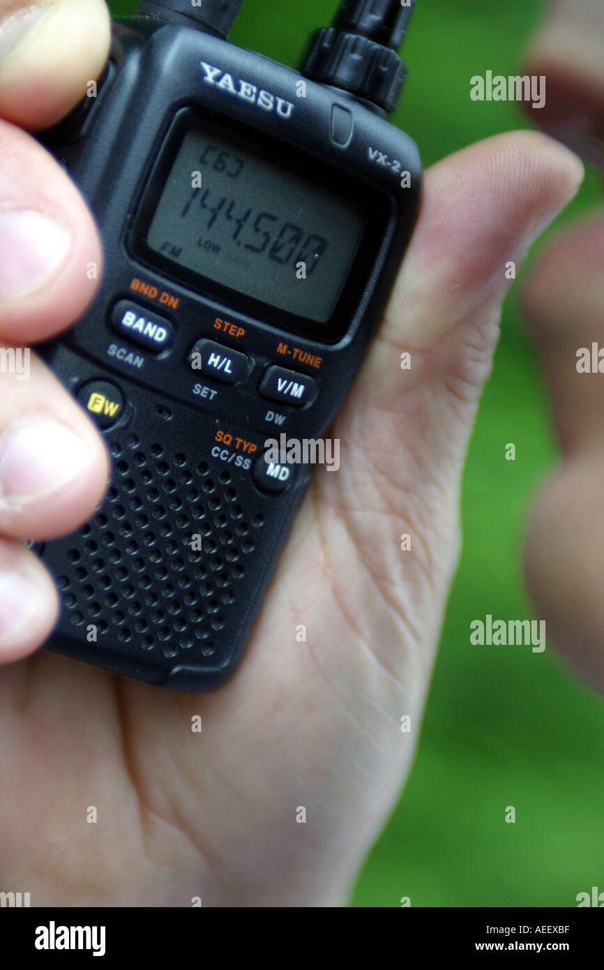 man using a two way communications radio Stock Photo Alamy