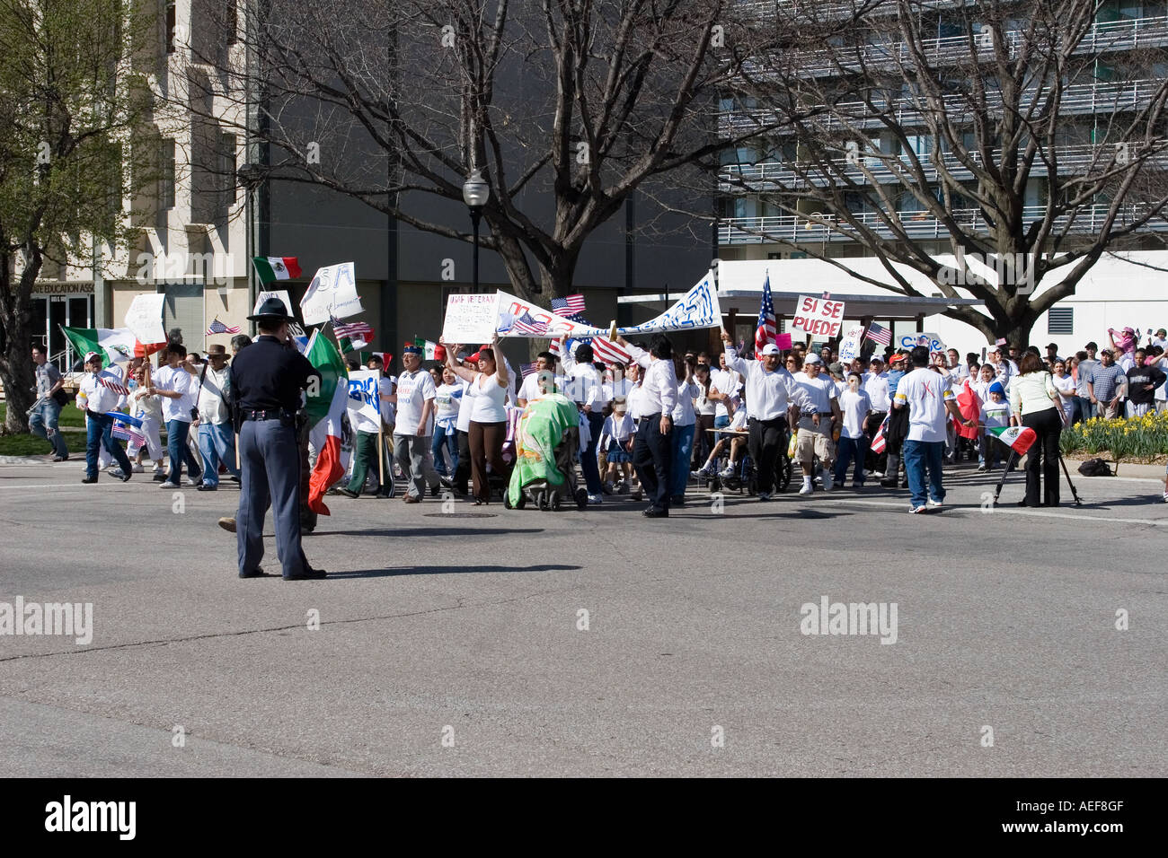 Lincoln Police and Nebraska State Trooper keeping the peace at a demonstration for immigrant rights in Lincoln Nebraska. 2006. Stock Photo