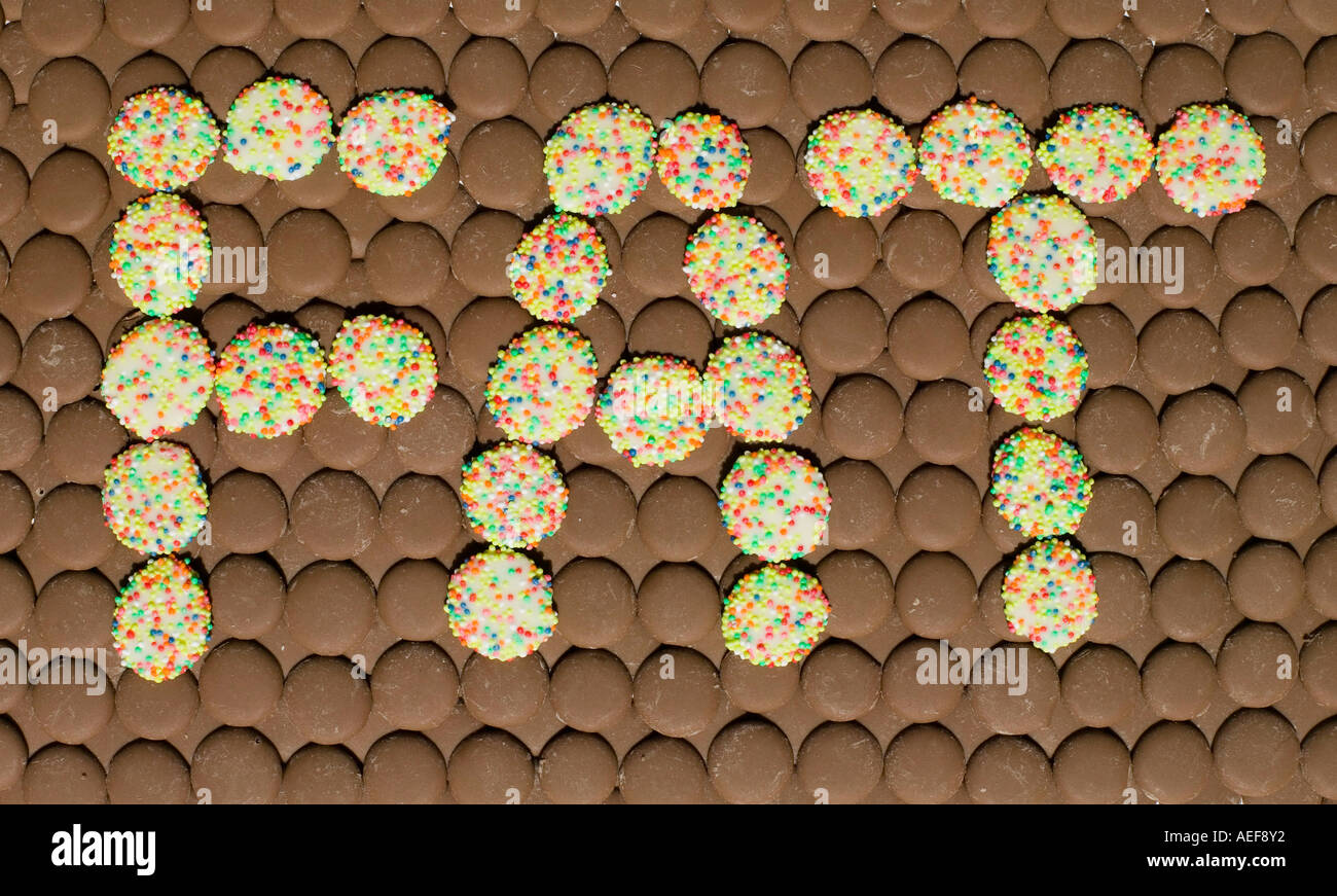 Chocolates Used To Spell Out The Word Fat Stock Photo Alamy