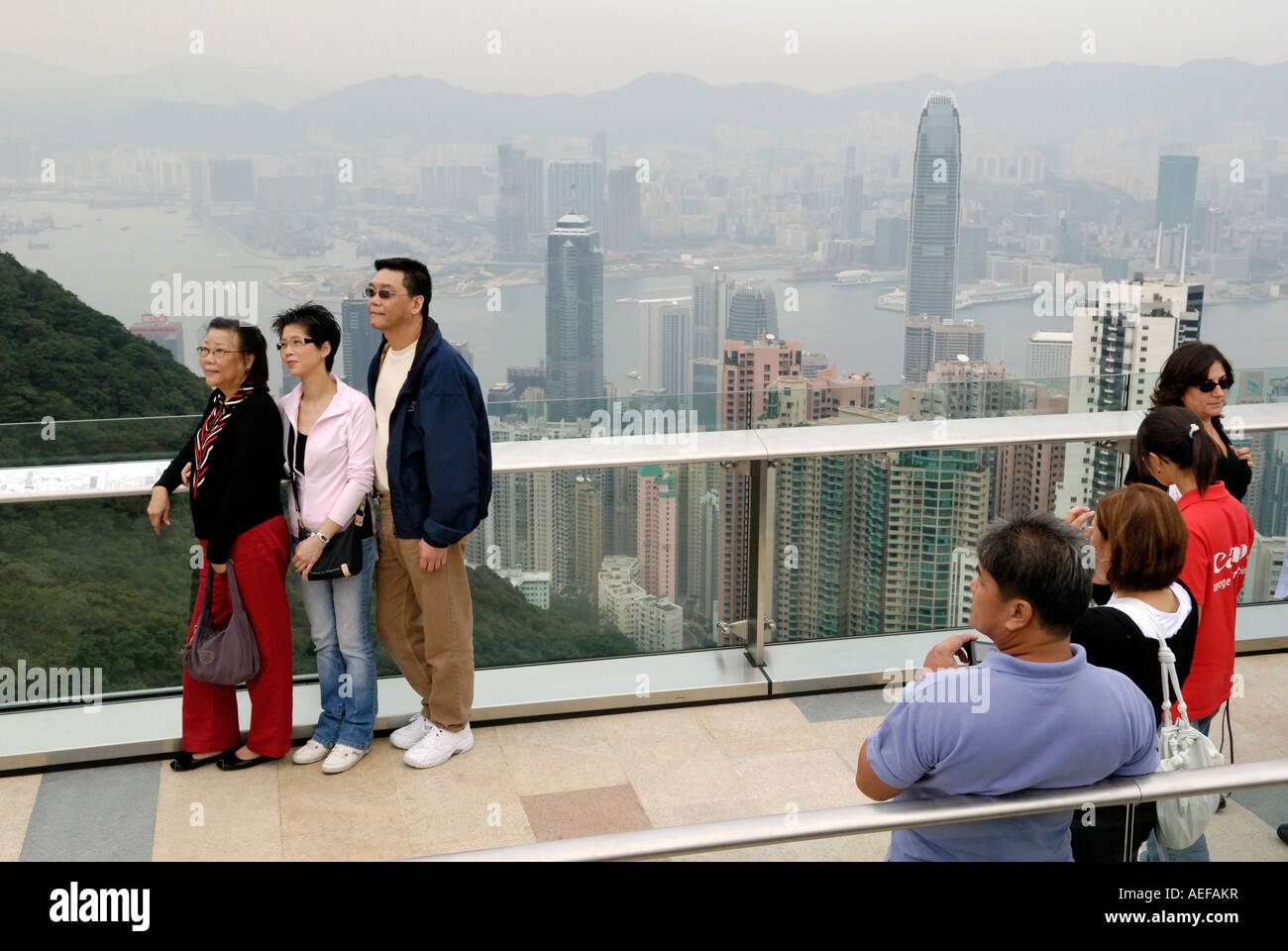 Hong Kong the harbour and Kowloon from 400 meter meters high. The view is often very bad due to the pollution. Stock Photo
