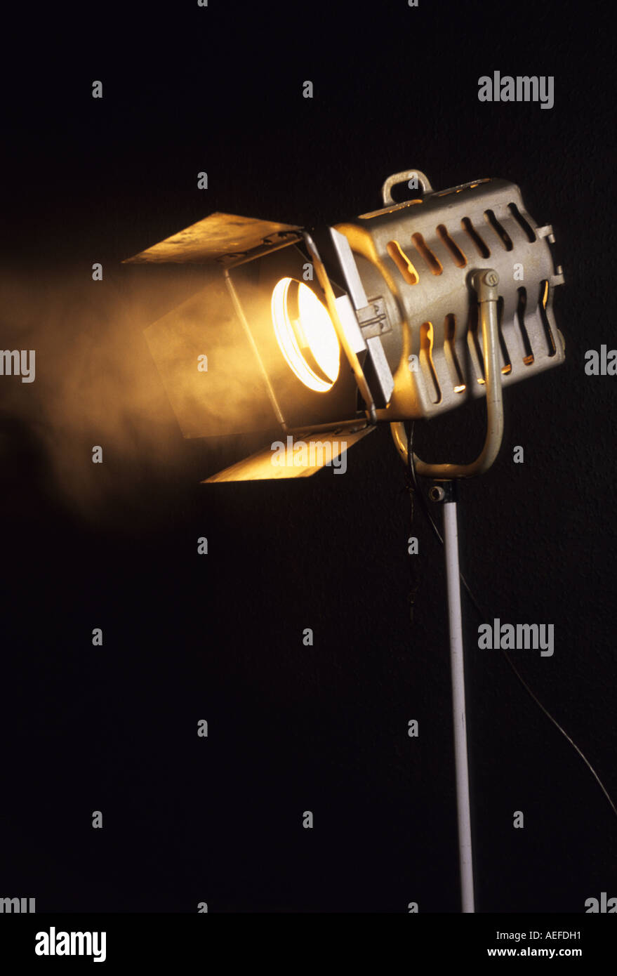 tungsten stage spotlight shining in studio Stock Photo