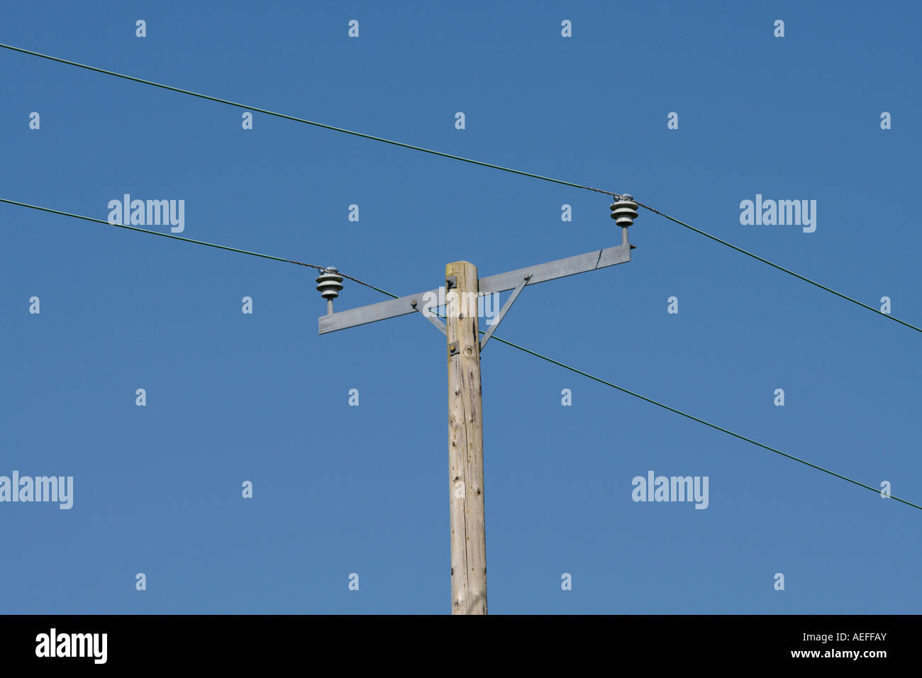 Overhead electricity cables on pole Stock Photo