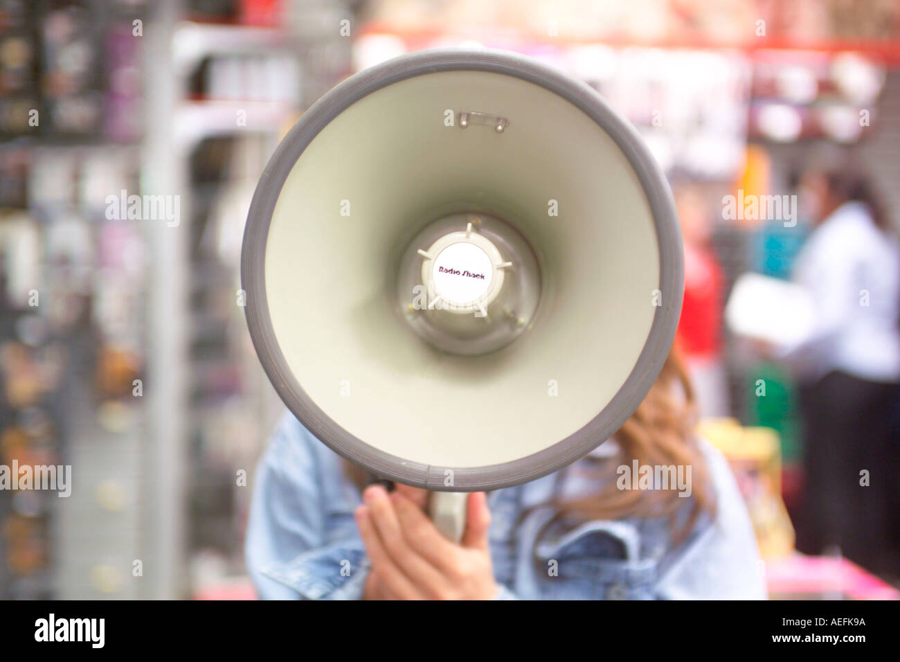 Person using megaphone Stock Photo - Alamy