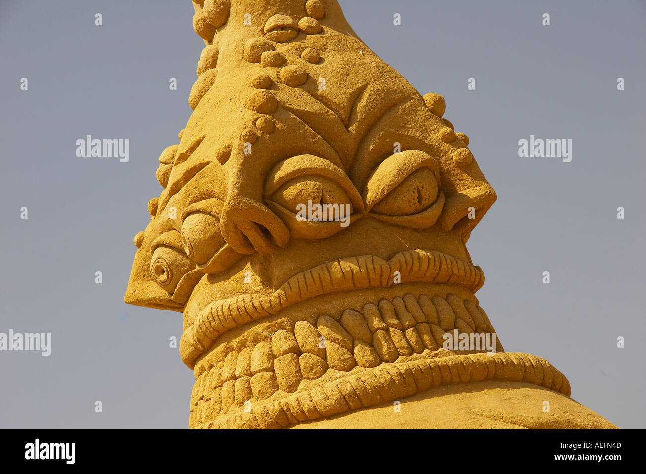 sand sculpture of giant octopus Stock Photo